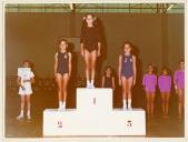 Atletas medalhados no pódio.